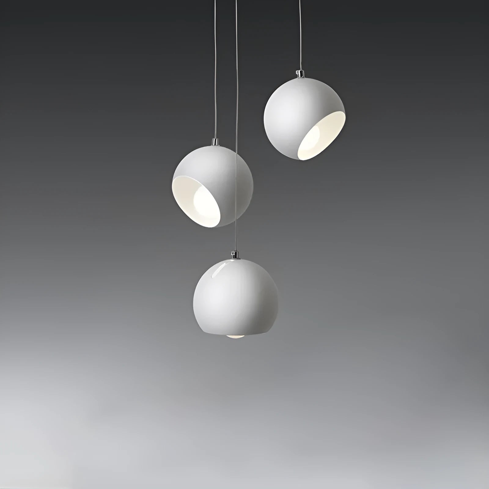 Post-modern ball chandelier table lamp in Moon White or Obsidian Black finish, available in single-head or three-head configurations.