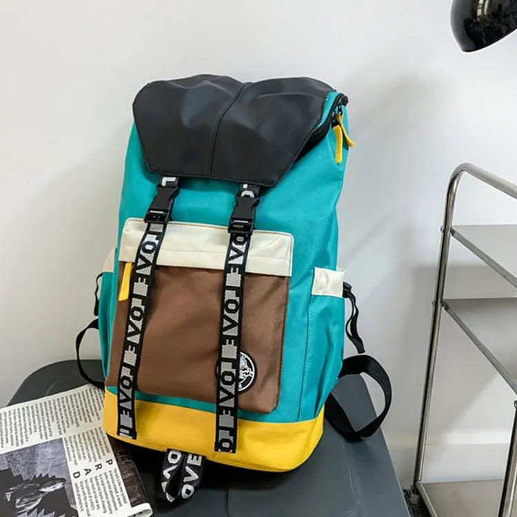 Oxford cloth backpack in black, green, or red with multiple carry handles