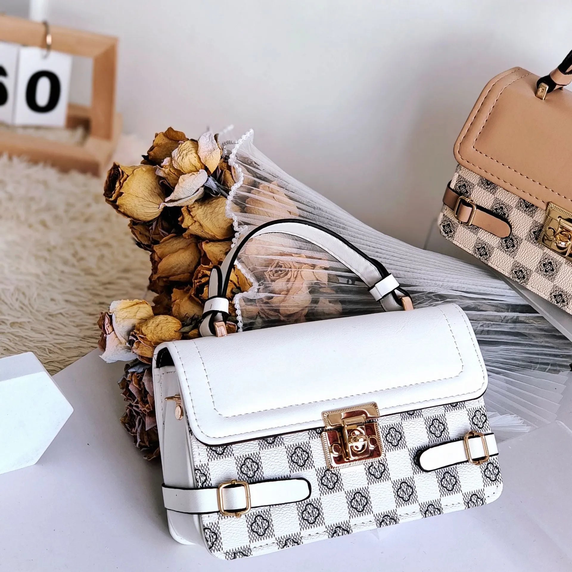 Retro square crossbody bag with ethnic floral stitch patterns and horizontal suitcase shape