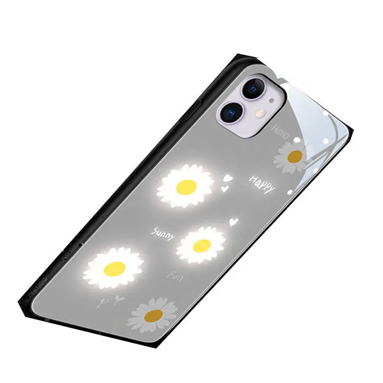 Luminous iPhone case with voice-activated colour light showing painted daisy and broken flower design on TPU protective shell
