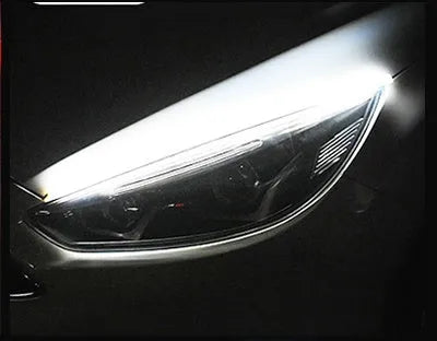 Car LED daytime running light strip with flowing turn signal function in silicone waterproof housing