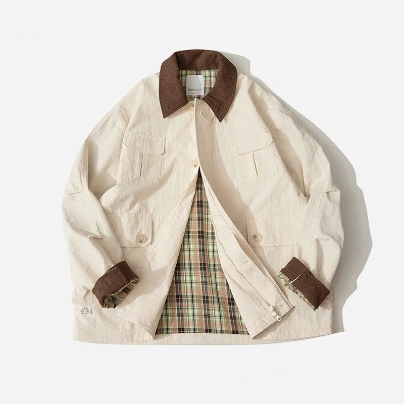 Green and apricot contrast colour casual jacket with side seam pockets on mannequin