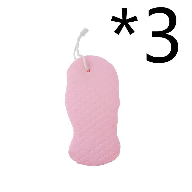 White 3D fish scale pattern bath sponge ball on a bathroom surface