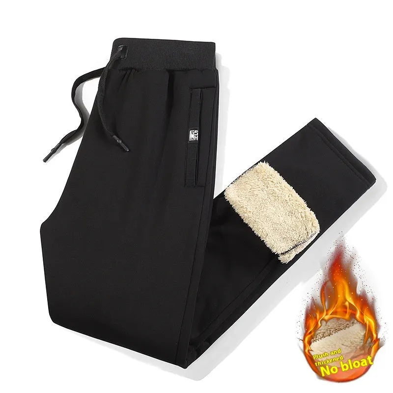 Men's grey fleece-lined cotton track pants with elastic waistband shown on hanger