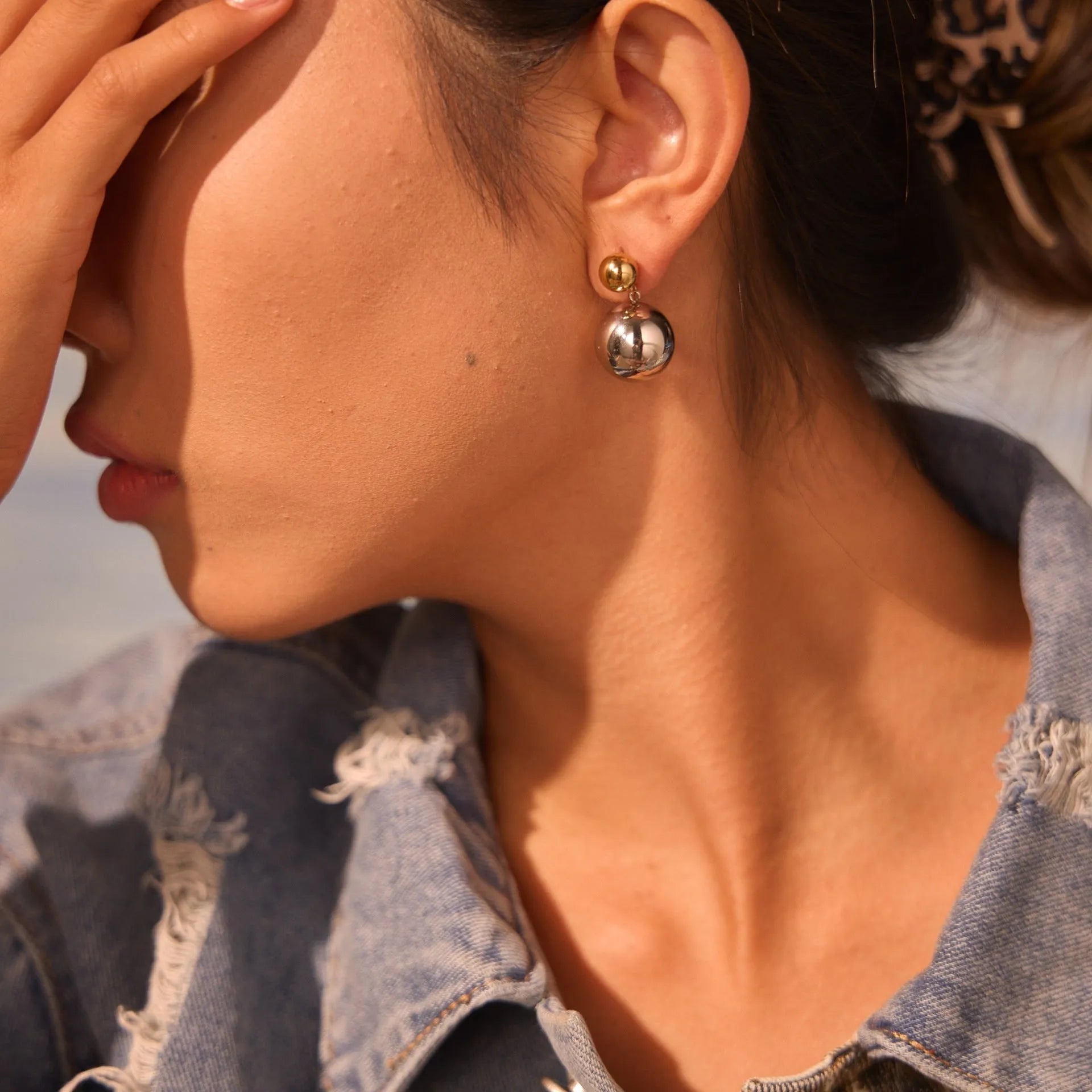 Women's geometric sphere ear studs with stainless steel construction and 18K gold electroplated colour-block finish