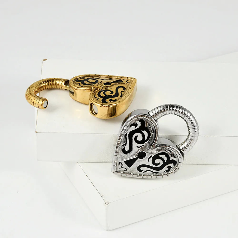 Heart-shaped stainless steel earrings in gold or steel colour with electroplated finish