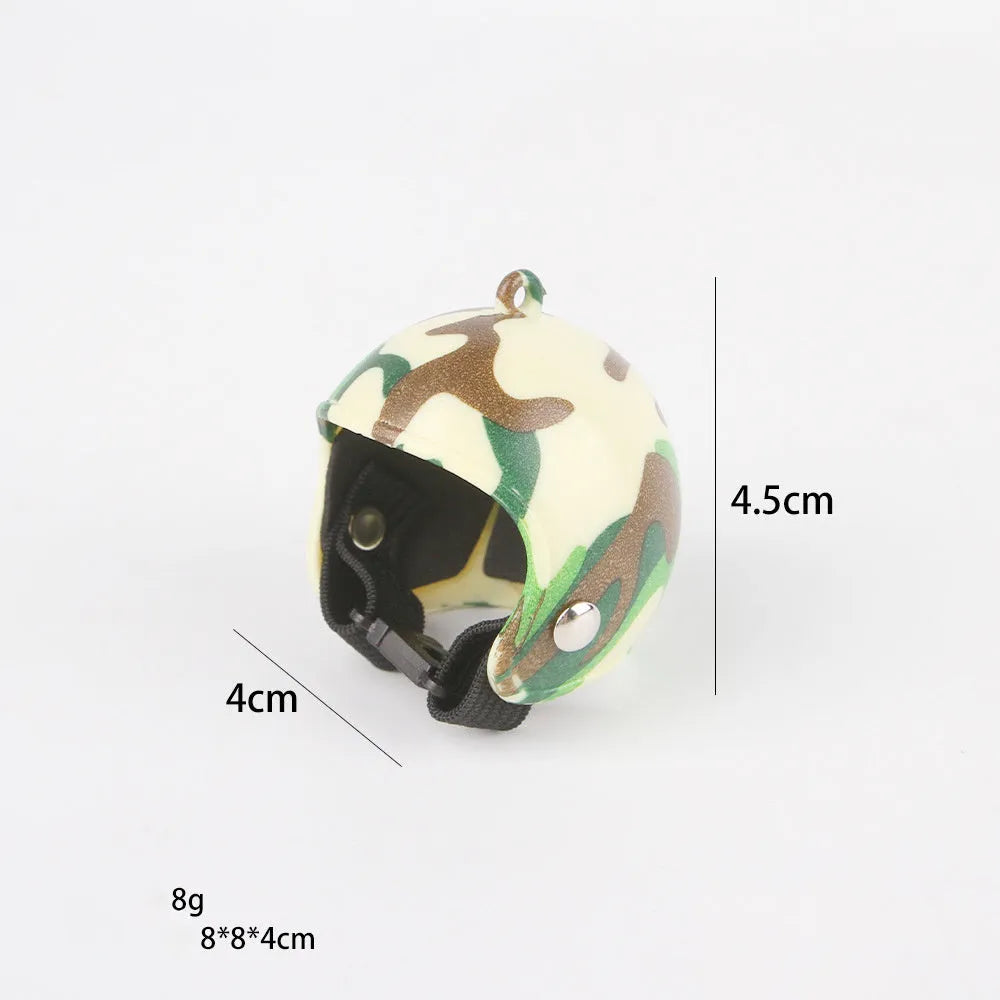 Small hard plastic helmet with elastic straps and sponge lining for a chicken or pet bird.