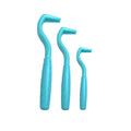 Set of three coloured tick removal hooks for dogs on a white background.