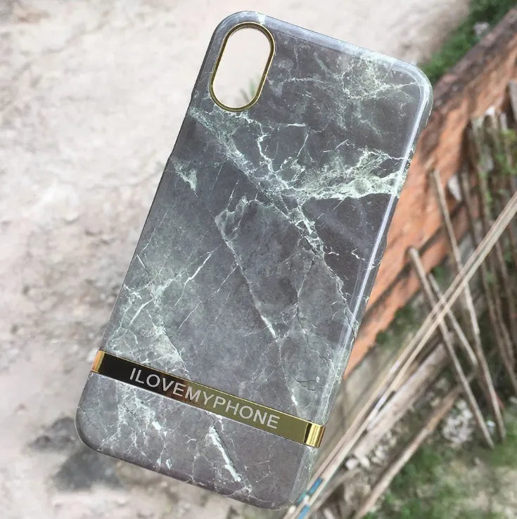 Marble pattern plastic case for iPhone on a table, shown in multiple colour options.