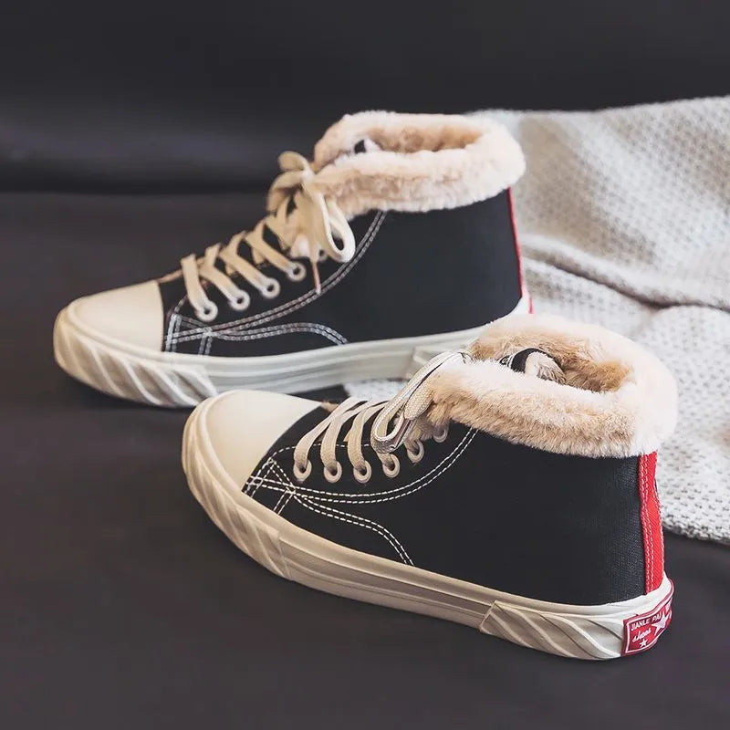Black women's winter canvas shoes with velvet lining, animal pattern, buckle fastening, low-top rubber sole.