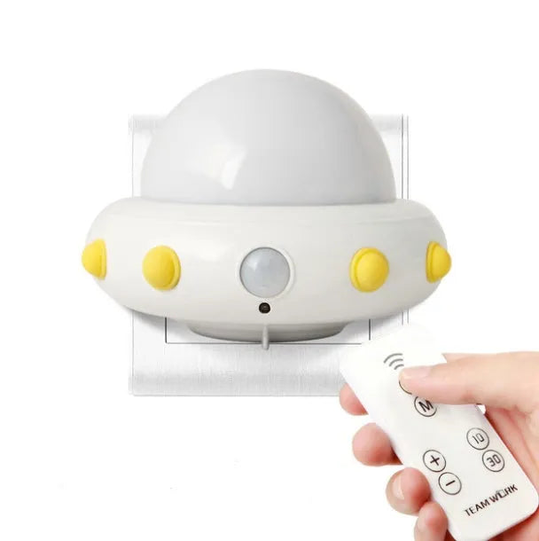Blue remote control UFO shaped bedside night light with dimensions 105mm by 76mm by 58mm