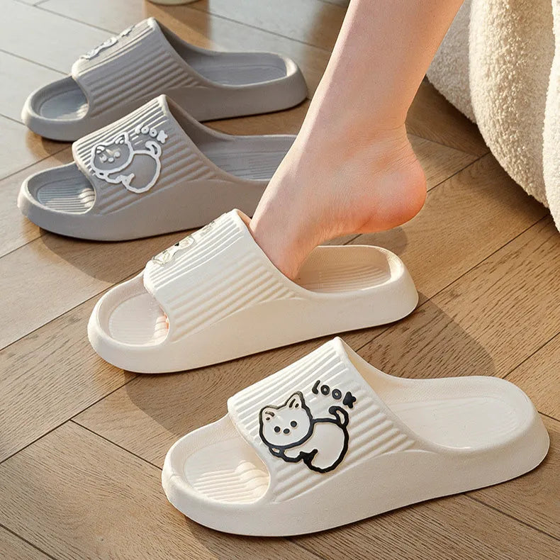 Green EVA cat flip-flop slippers with a thick platform sole on a white background.