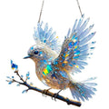 Square clear acrylic bird pendant ornament with colourful cartoon design, shown with cardboard backing.