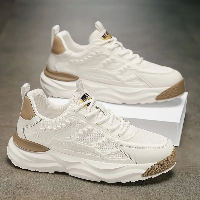 Men's white and black breathable mesh sports shoes with round toe design.