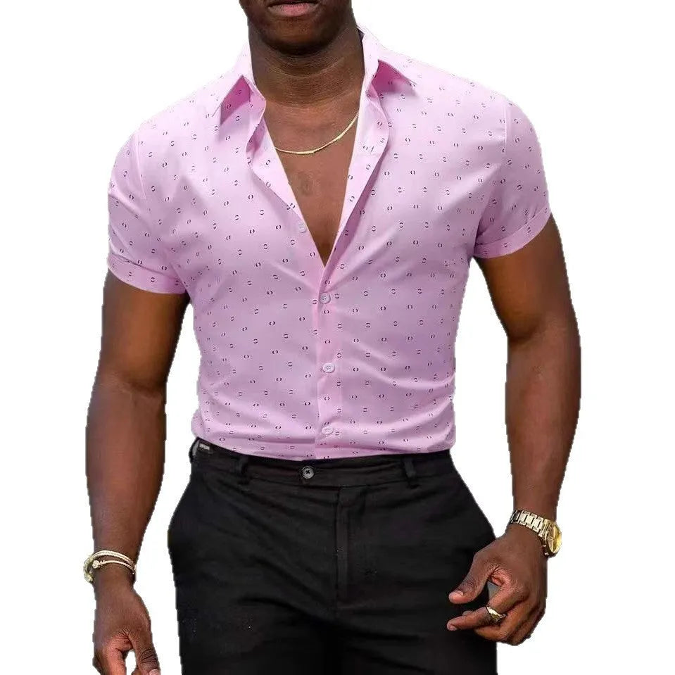 Man wearing a light blue short-sleeved shirt with an all-over floral print and a regular cardigan fit.