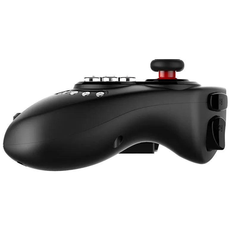 Wireless telescopic gamepad controller extended with mobile phone showing directional pad and buttons