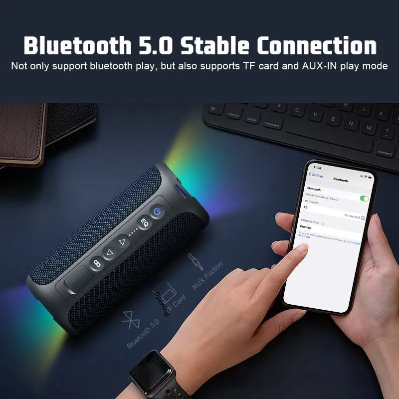 Black and blue fabric wireless Bluetooth speaker with lighting effects showing front view