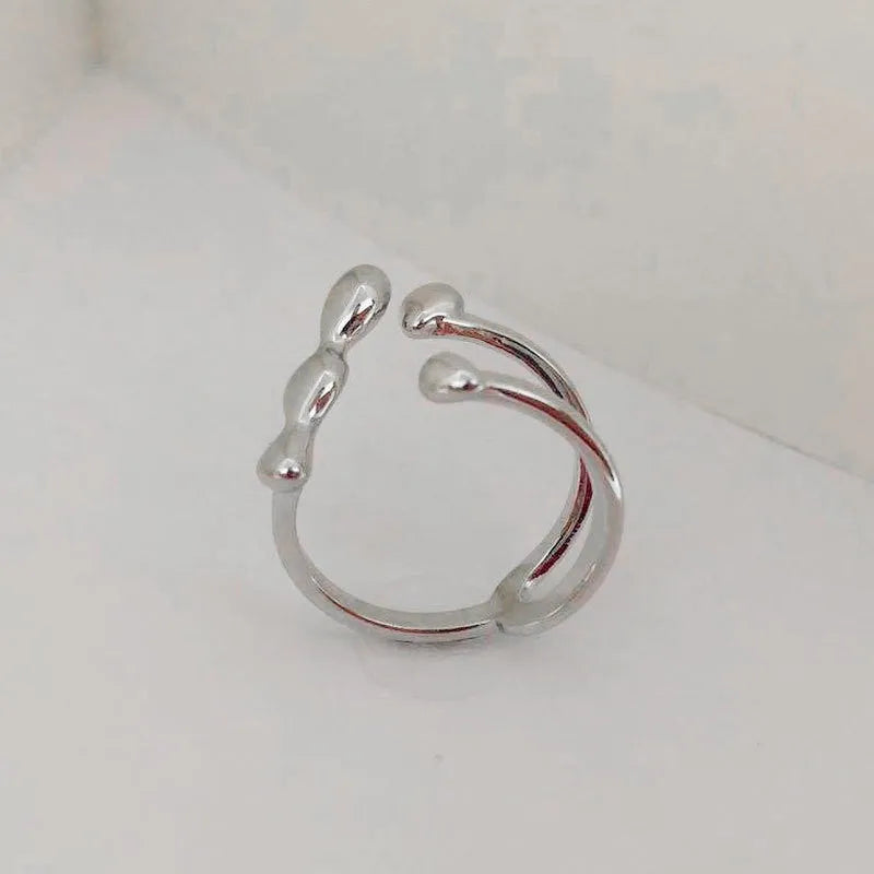 Brass fashion ring with spherical design in gold or silver colour for women's jewellery