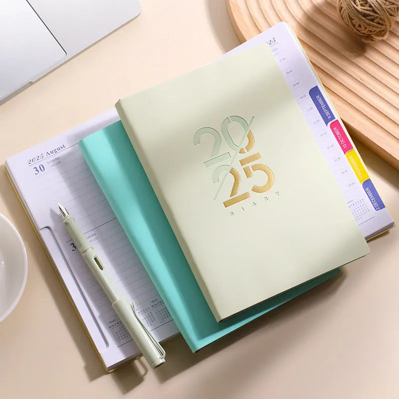 A5 daily planner with soft faux leather cover showing multiple colour options including pink yellow purple blue green