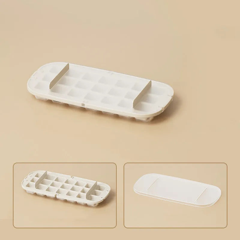 Blue food-grade plastic ice cube tray with grid design and integrated ice shovel storage.