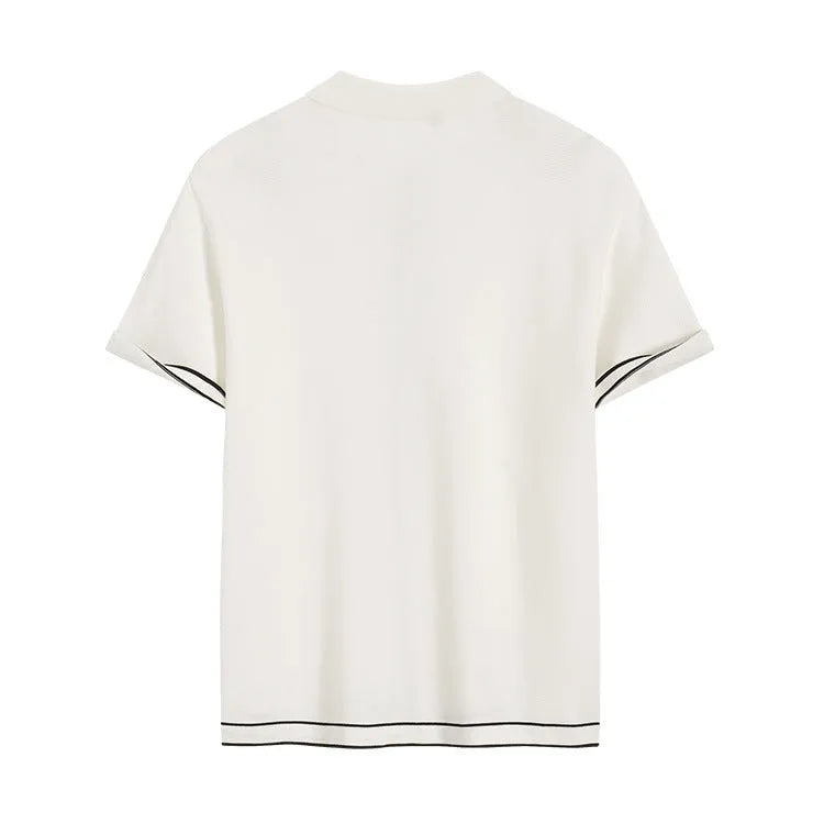 White cardigan with contrast colour lapels and short sleeves laid flat