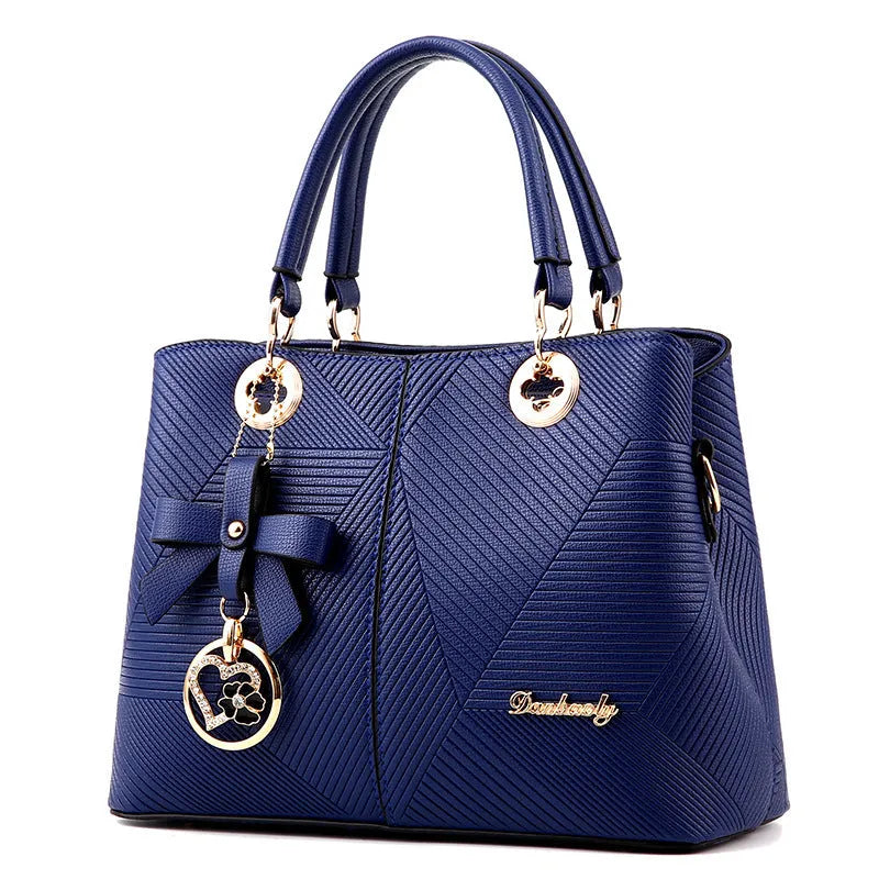 Retro PU leather handbag with zipper closure and shoulder strap in assorted colours