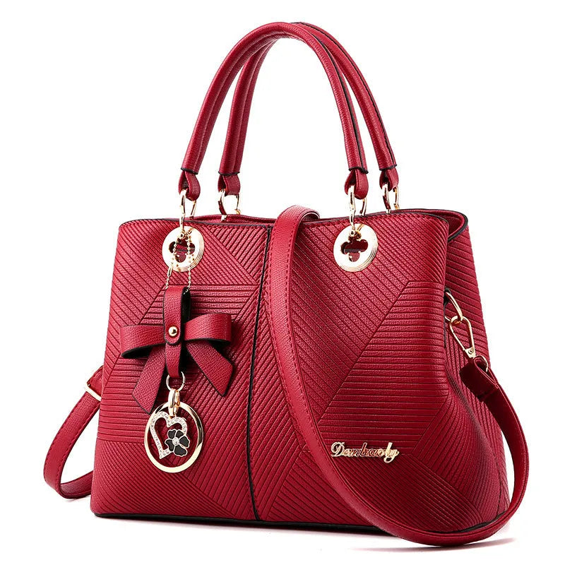 Retro PU leather handbag with zipper closure and shoulder strap in assorted colours