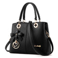 Retro PU leather handbag with zipper closure and shoulder strap in assorted colours
