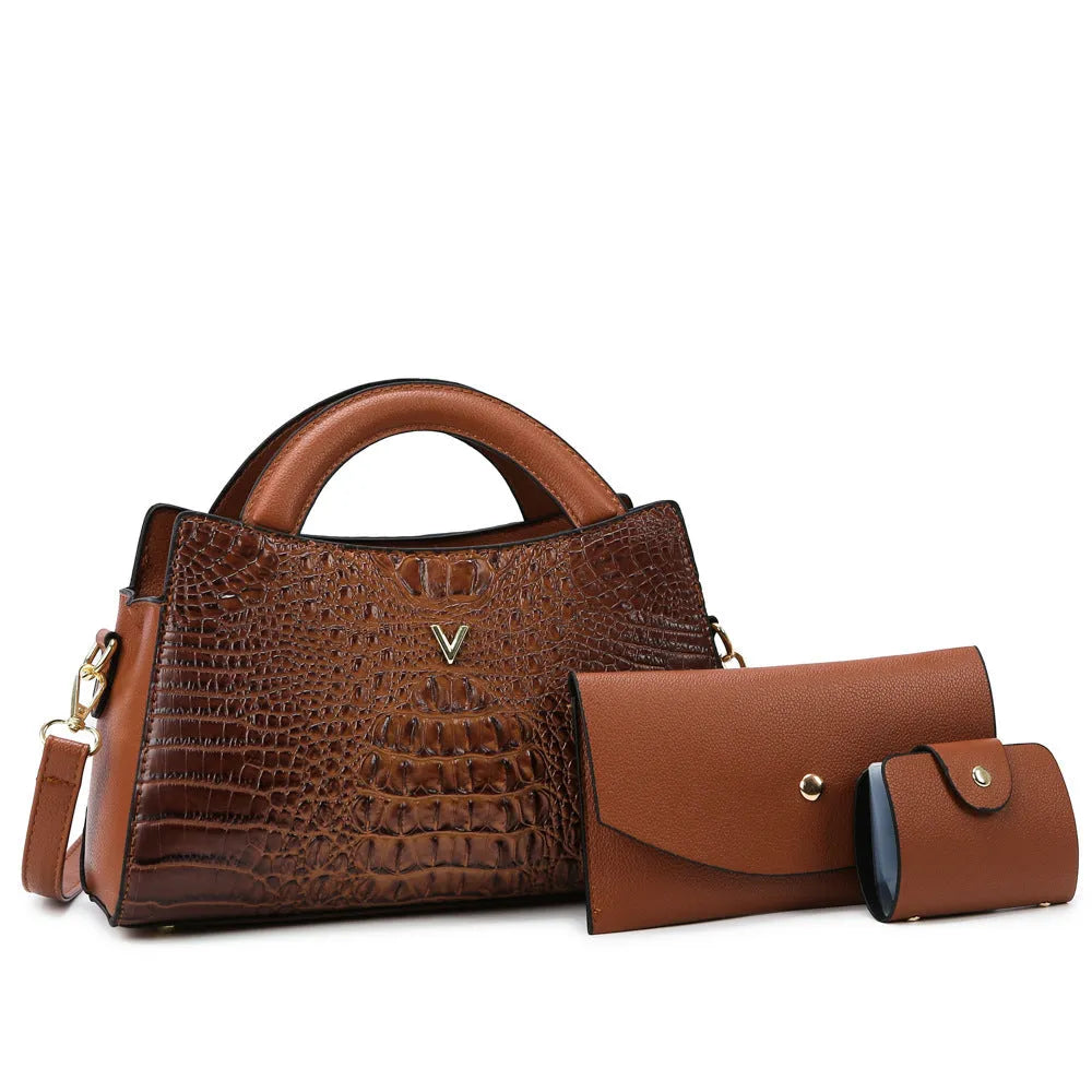 Women's black crocodile pattern PU leather crossbody handbag showing square shape and single shoulder strap.
