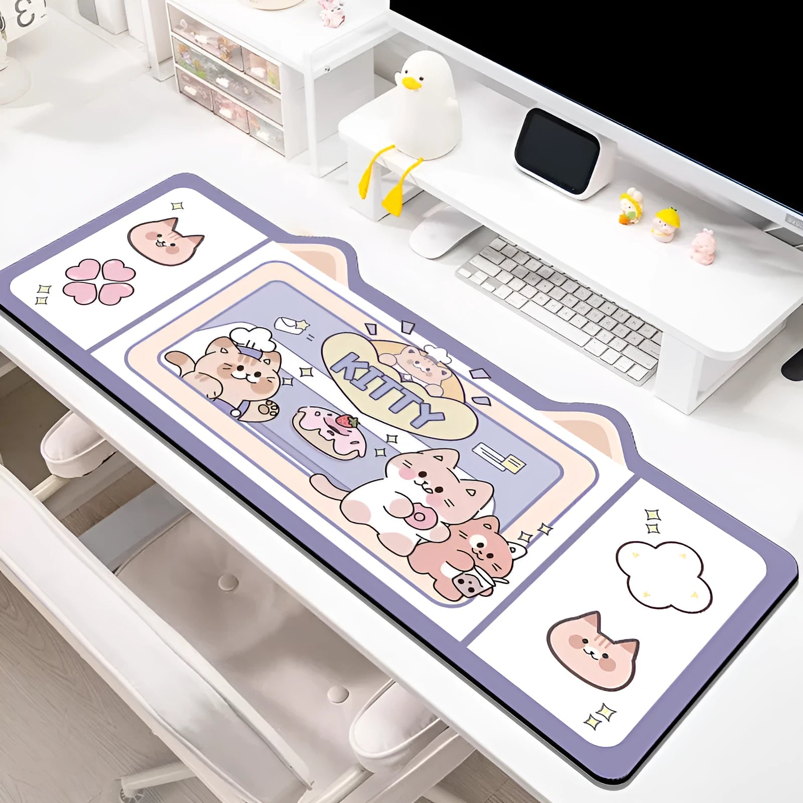 Oversized natural rubber mouse pad desk mat in pink bunny design on desk surface
