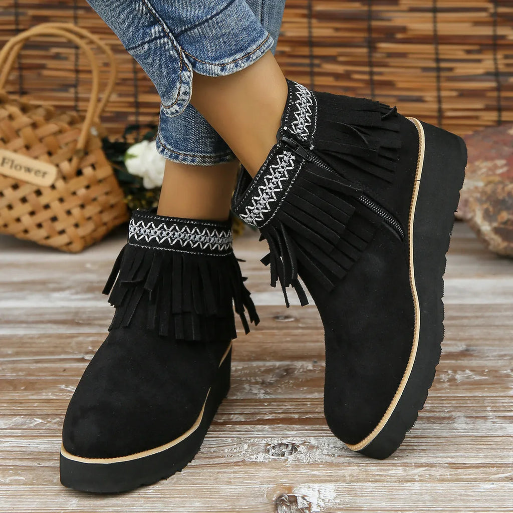 Women's wedge boots with suede upper, waterproof platform, thick rubber sole, side zip, and tassel detail