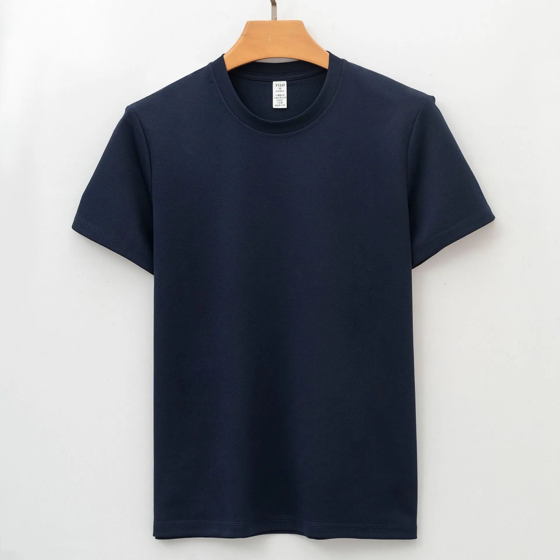 Men's solid colour quick-dry antibacterial short sleeve t-shirt on a hanger.