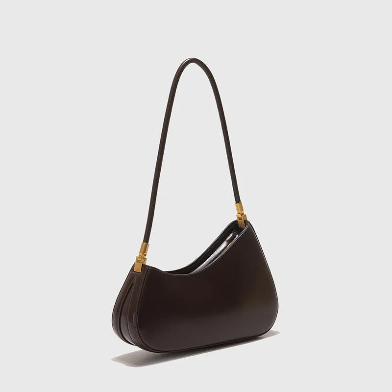 Women's oval shaped underarm bag in PU leather with single shoulder strap and internal zipper compartment