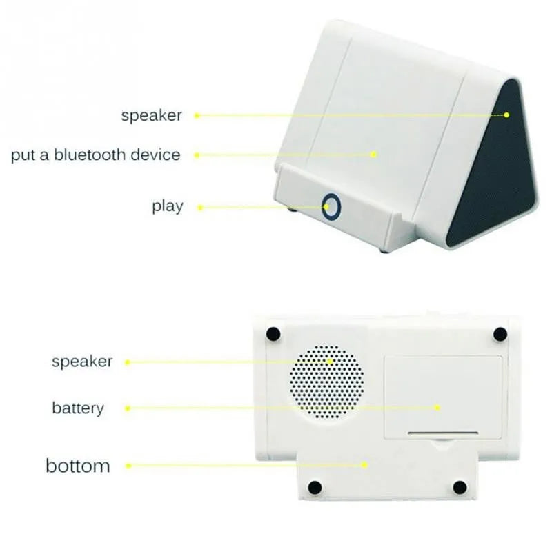 Black and white mini wireless Bluetooth speaker for mobile phones and computers.