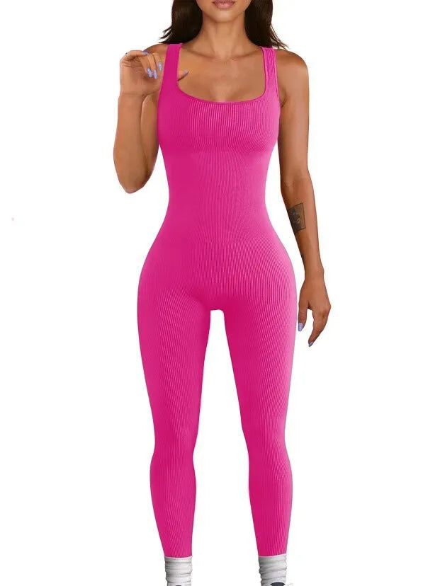 Women's beige suspender tank top tights with button detailing and long sleeves made from spandex fabric.