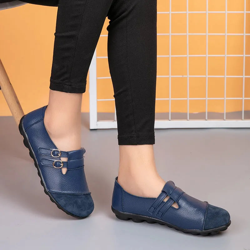 Men's brown leather casual flat shoes with Velcro strap, shown on a white background.