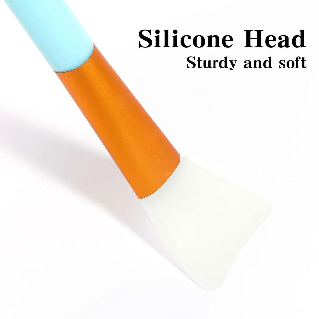Reusable silicone face and body mask applicator spatula in six colour options.