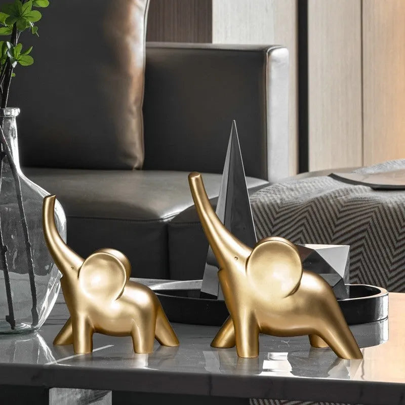 Modern resin elephant ornament in rose gold or white finish, available in large and small sizes