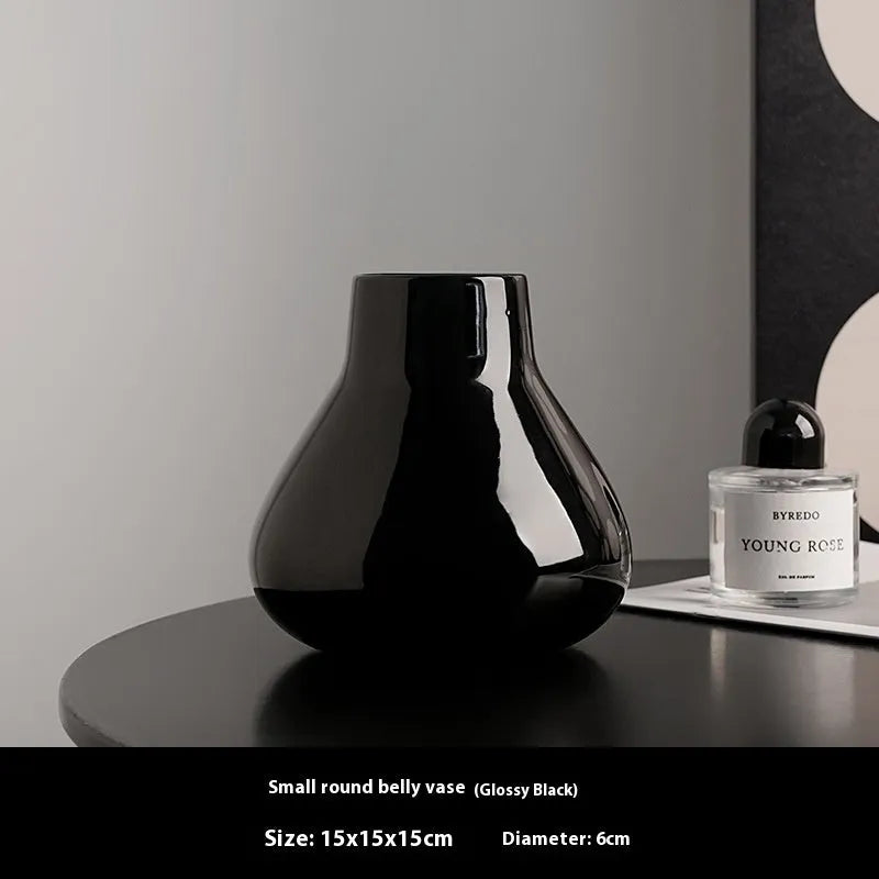 Black and white round belly ceramic decorative vase with optional artificial orchid flowers