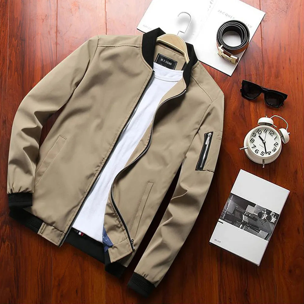 Men's slim fit casual jacket in a solid colour with a stand collar and side zippered pockets.