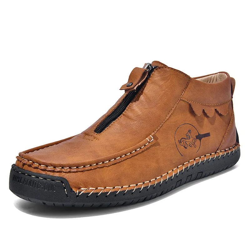 Men's black slip-on leather loafers with a round toe and rubber sole on a white background.