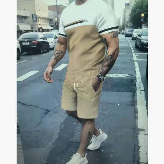 Men's loose-fit short-sleeved T-shirt and shorts set in a light colour for summer.