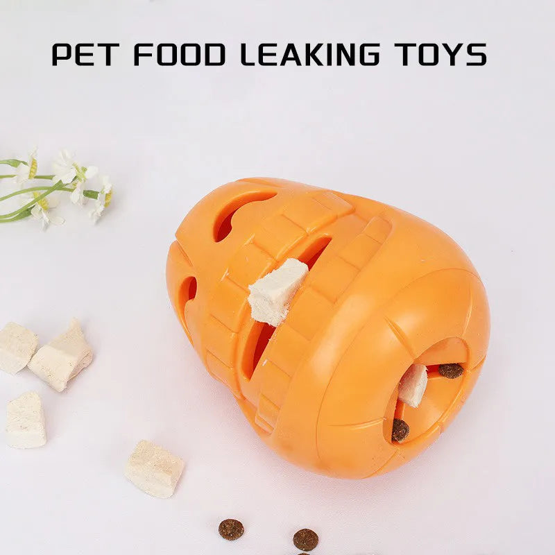 Orange Halloween pumpkin shaped dog chew toy with a treat dispensing funnel.