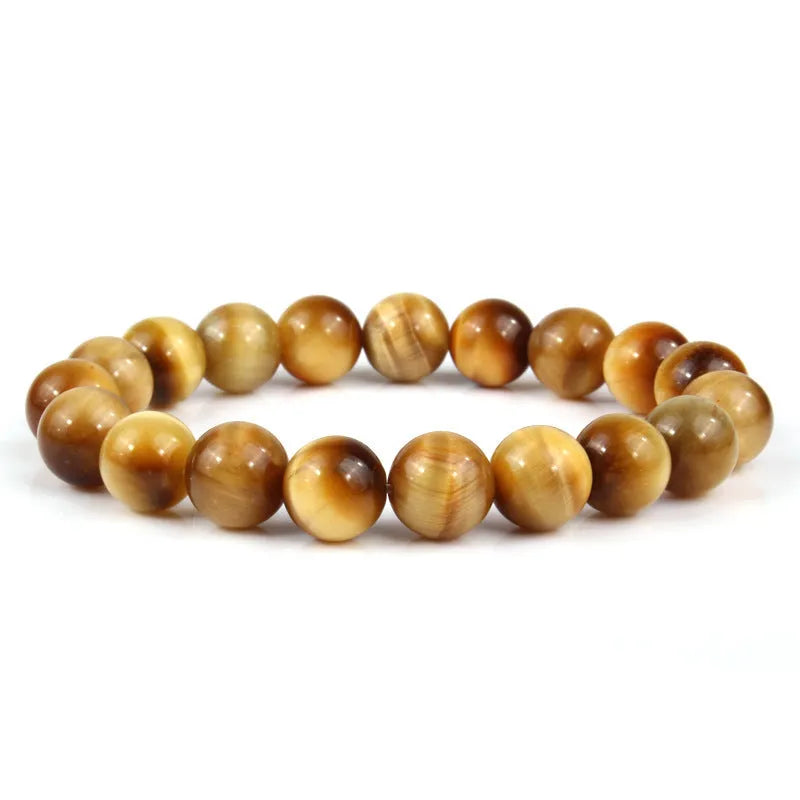 Natural tigereye crystal bracelet with geometric round beads showing colour and size options.