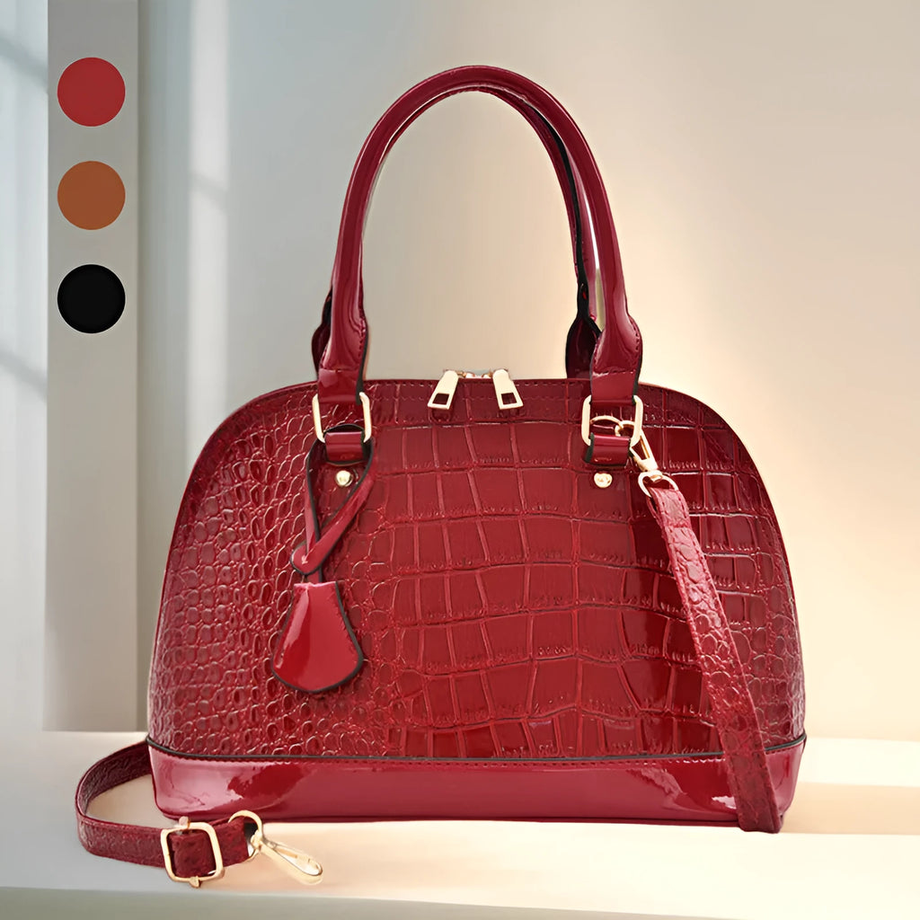 Shiny PU crossbody shoulder bag in shell shape showing black, brown, and red colour options