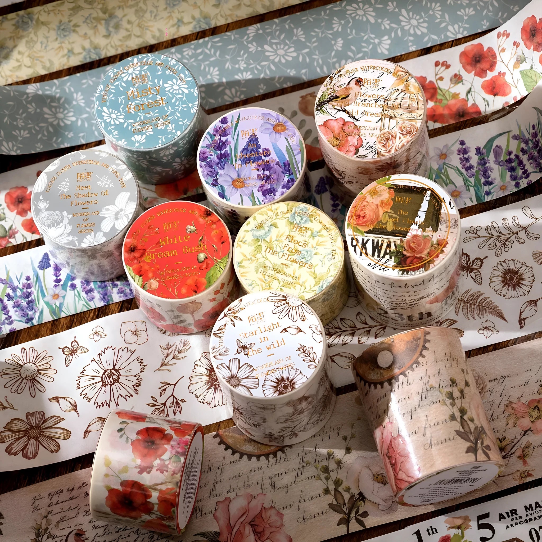Roll of vintage floral watercolour decorative tape on a Japanese paper base, showing designs like Fog Mountain Forest.