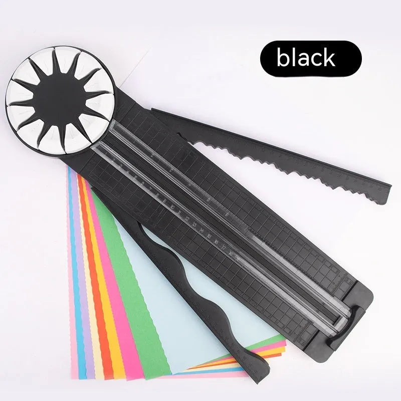 Plastic paper cutting machine with 12 multifunctional heads in pink colour on craft table
