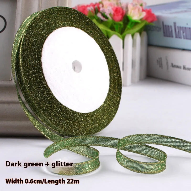 Roll of narrow 0.6cm wide polyester gift wrapping ribbon in assorted colours, showing 22 metre length.