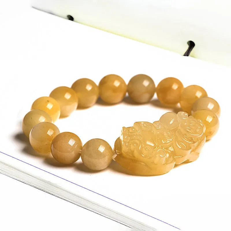 Personalised Money Jade Bracelet carved from Golden Thread Jinsi Jade, showing large and small size options.