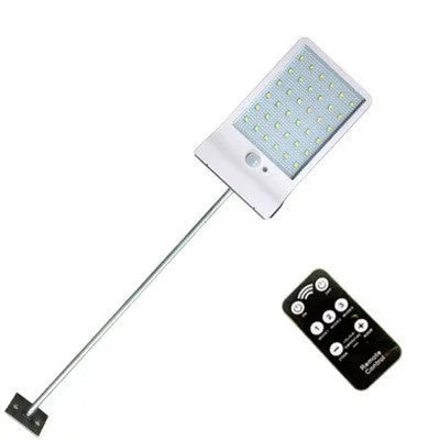 Black and white outdoor solar-powered garden lamp with IP65 waterproof rating for courtyard and balcony lighting.
